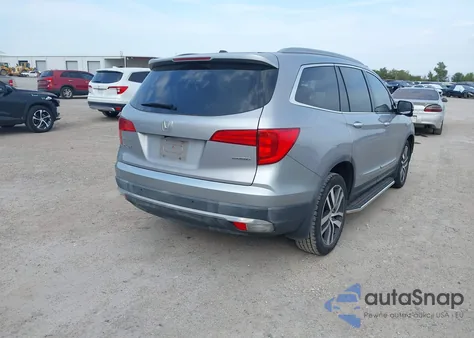 2017 Honda Pilot Touring z USA, uszkodzony, nr VIN 5FNYF5H98HB045265
